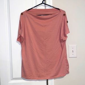 Beautiful, soft pink with calico button accents off the shoulder shirt.